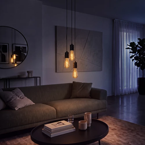 Lucide ST64 TWILIGHT SENSOR - Filament lamp - Ø 6,4 cm - LED - E27 - 1x4W 2200K - Dag/nacht sensor - Amber - sfeer 2